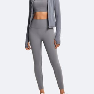 Model wearing a grey 3 piece eco-friendly activewear set with jacket