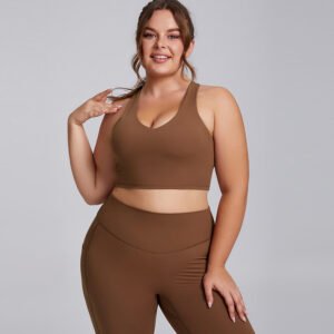 Woman wearing a plus size Y-back high support sports bra