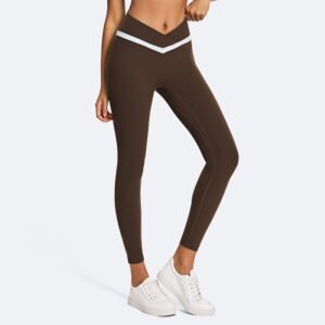 Woman wearing eco-friendly crossover waist yoga leggings with contrast trim details