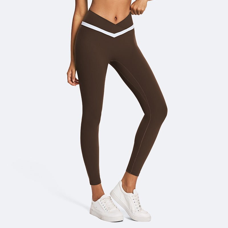 Custom Private Label Eco-Friendly Crossover Waist Yoga Leggings L902 1 Woman wearing eco-friendly crossover waist yoga leggings with contrast trim details