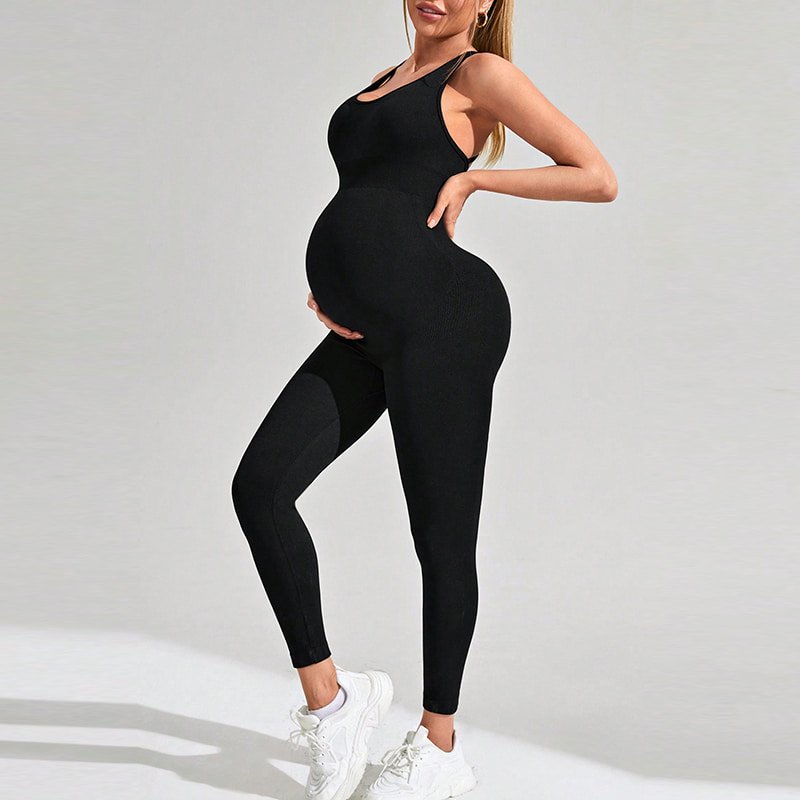 Source Factory Seamless Strappy Back Maternity Yoga Jumpsuit N24309 1 Pregnant woman wearing black strappy back maternity yoga jumpsuit