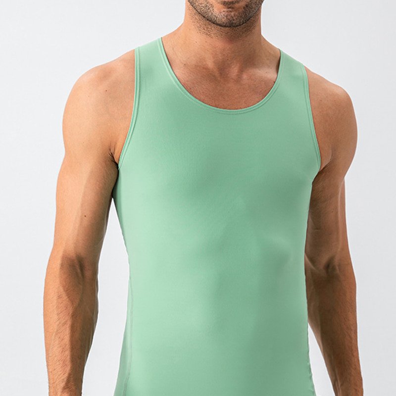 Men's lightweight nude-feel yoga tank top in sage green showing ergonomic compression fit