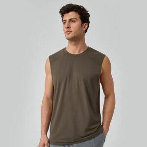 Model wearing men's loose fit sleeveless workout shirt in olive green